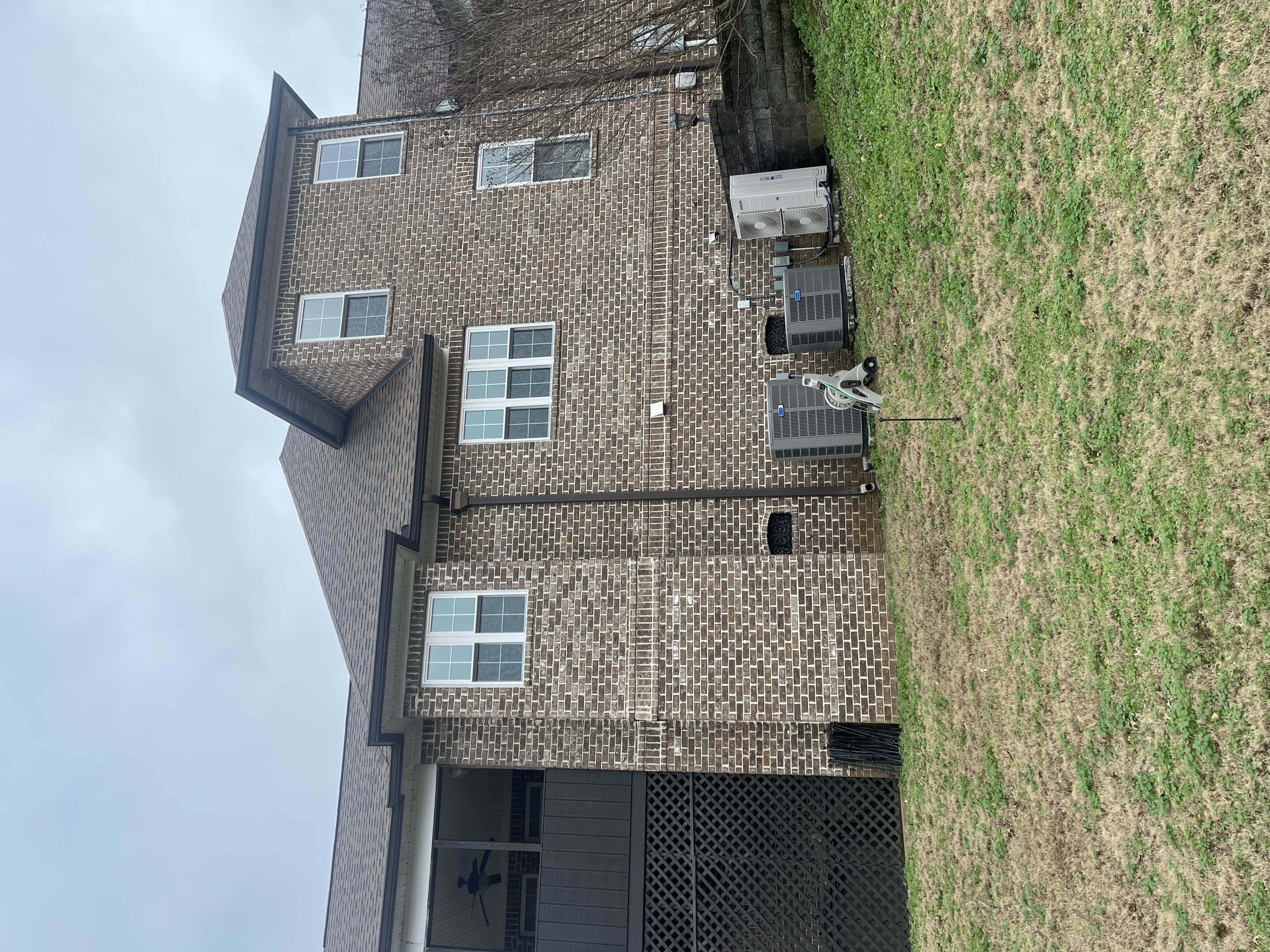 custom vinyl windows on brick home