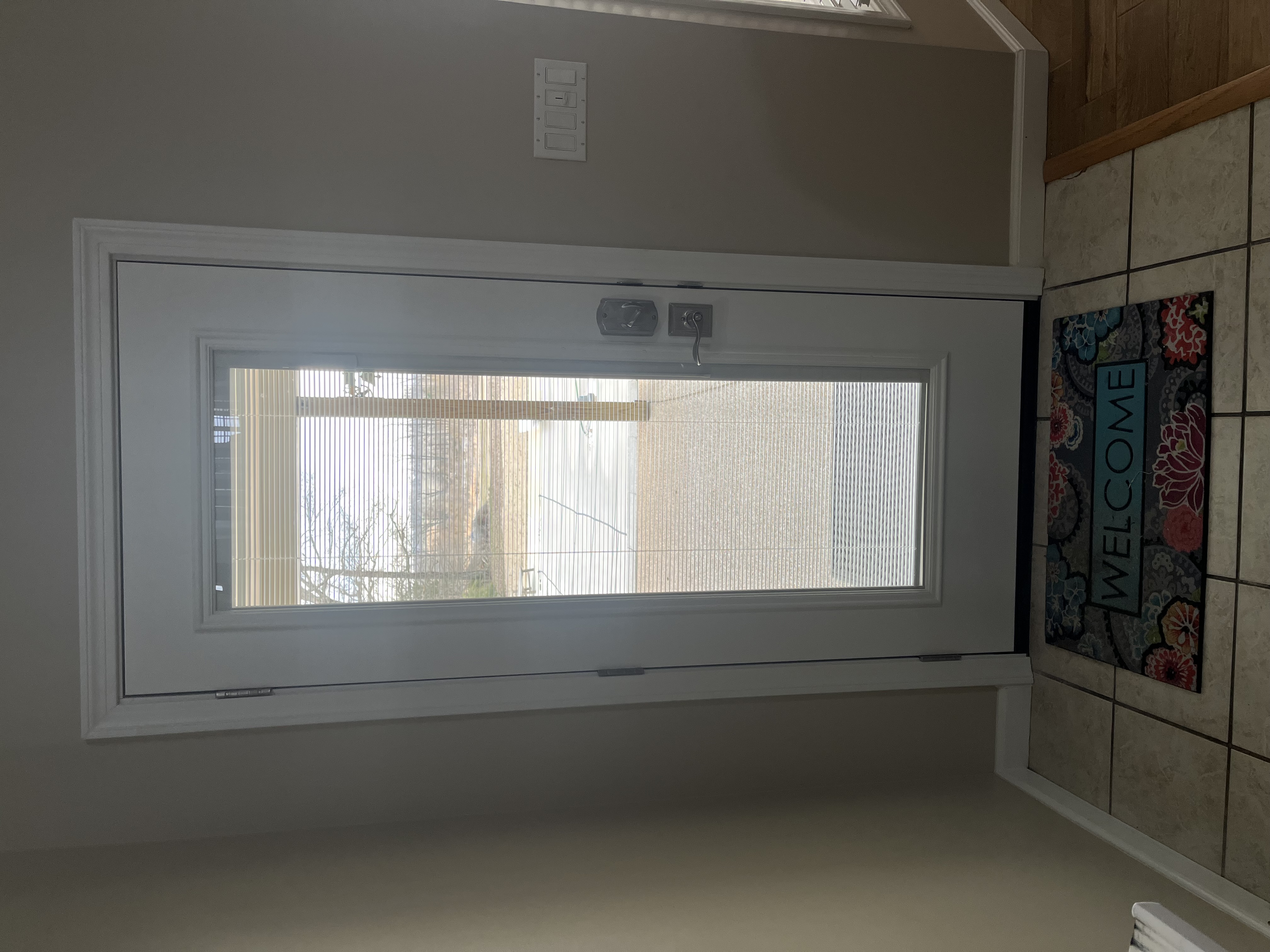 glass door with enclosed blinds