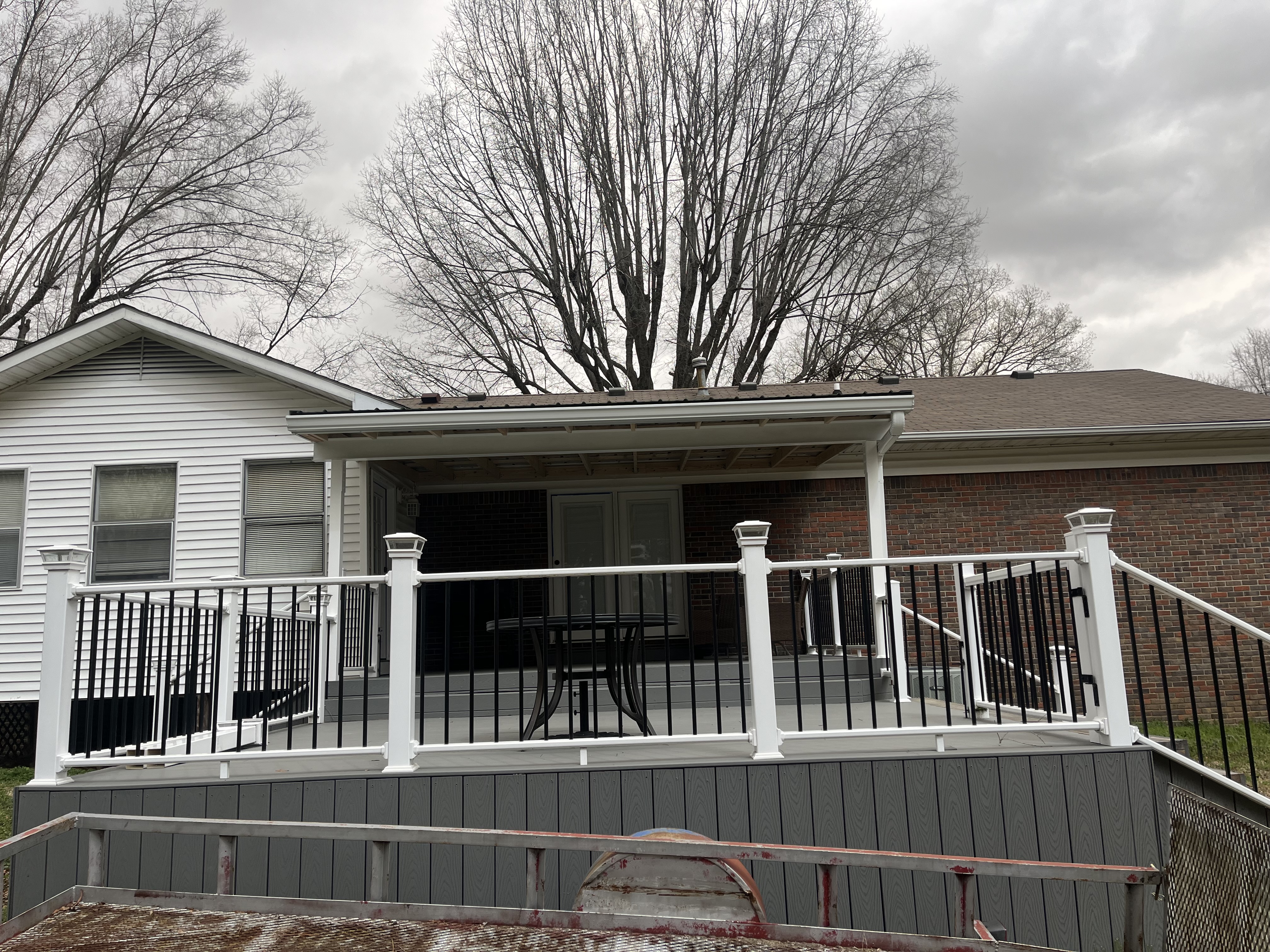 black and white vinyl porch rails